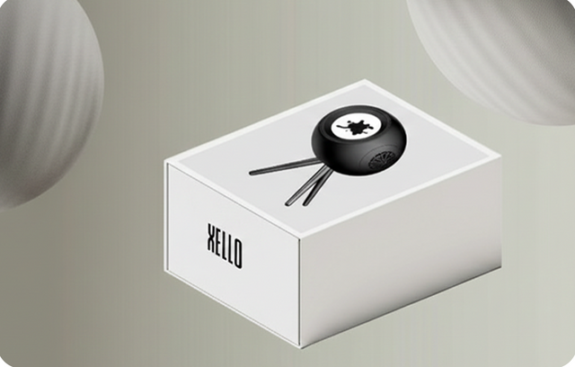 XELLO Glowbe ferrofluid Bluetooth speaker displayed on branded packaging with sleek tripod stand and modern design